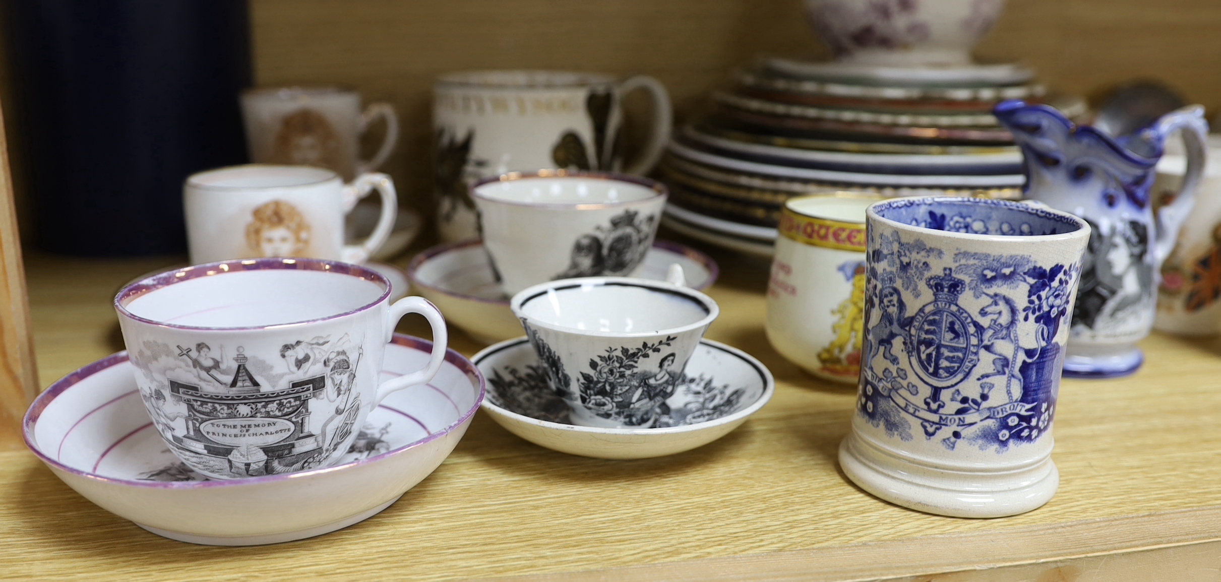 A mixed varied collection of 19th century and later commemorative wares to include a Princess Charlotte lustre cup and saucer, Victoria and Albert nursing plates, cups etc, the largest 25cm in diameter